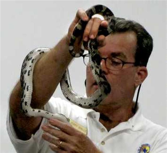 Image of Jerry Walls with a Pine Snake.