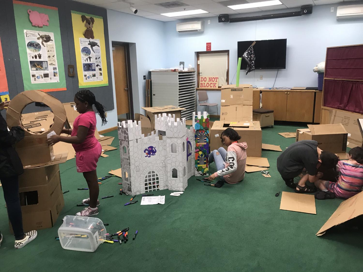 Image of children building cardboard castles